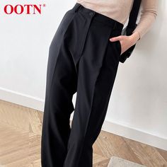 SPECIFICATIONSWaist Type: HIGHStyle: Office LadySeason: Spring/AutumnPattern Type: SolidPant Style: StraightOrigin: CN(Origin)Model Number: CK8544Material: PolyesterLength: Full LengthGender: WOMENFront Style: PleatedFit Type: LOOSEFabric Type: WovenDecoration: Fake ZippersDecoration: PocketsClosure Type: Zipper FlyBrand Name: OOTNAge: Ages 18-35 Years Old Black Full-length Pants With Pockets, Baggy Black Full-length Dress Pants, Black Wide-leg Dress Pants With Loosely Fitted Hips, Black Straight Pants, Washed Black Wide-leg Pants With Pockets, Black Straight-leg Pleated Pants, Baggy Trousers, Pocket Pants, Straight Pants