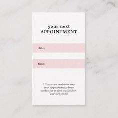 a white and pink appointment card sitting on top of a marble surface with the words, your next appointment