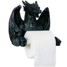 a black dragon statue holding a roll of toilet paper