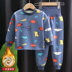 Our Cartoon Long Sleeve Pajama Sets is the perfect addition to your child's sleepwear collection this autumn season! Featuring a cute and playful cartoon design, these pajama sets are sure to make your child smile and feel cozy and comfortable.Made from high-quality materials, these pajama sets are thick, soft, and warm, making them perfect for colder autumn nights. The long sleeve T-shirt tops provide ample coverage and warmth, while the matching pants ensure maximum comfort and ease of movemen Cotton Pajama Sets For Winter Pajama Party, Cotton Pajama Party Sets For Winter, Cotton Pajama Sets For Winter Party, Cotton Sets For Pajama Party In Winter, Cotton Long Sleeve Cartoon Print Sleepwear, Cotton Long Sleeve Sleepwear With Cartoon Print, Cotton Sets For Bedtime In Winter, Long Sleeve Cotton Sleepwear With Cartoon Print, Winter Cotton Bedtime Sets