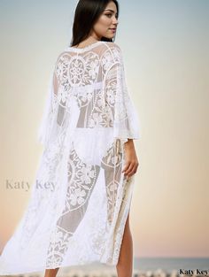 Katykey - Stylish Womens Boho White Floral Embroidered Cover Up Shirt - V Neck, Long Sleeves, Semi-Sheer Fabric - Ideal for Beach, Pool, and Resort Attire Embroidered White Beach Cover-up, White Long Sleeve Cover-up With Lace Trim, Embroidered White Cover-up For The Beach, White Embroidered Summer Cover-up, White Long Cover-up With Lace Trim, White Long Sleeve Festival Cover-up, White Embroidered Spring Cover-up, White Embroidered Cover-up For Beach Season, Embroidered White Cover-up For Vacation