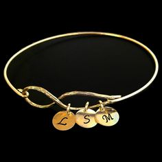 "Infinity is forever even if you are apart. This listing is for a set of 3 infinity best friend bracelets 3 initial charms on each. Mention initials you want in personalized box during checkout. Please let me know if you want the initials in the same order on all bracelets or a different order for each. For example; K S L on all three, or for a different order on each bracelet each initial is in the 1st, 2nd and 3rd spot on a different bracelet such as; 1st bracelet: K S L 2nd: bracelet: S L K 3 Hand Stamped Jewelry For Friendship, Adjustable Infinity Friendship Jewelry, Personalized Infinity Bracelets For Friendship, Adjustable Infinity Jewelry For Best Friend Gift, Initials Jewelry For Friendship, Birthday Gift Long Distance, 3 Best Friends Gifts, Own Best Friend, Long Distance Friendship Gifts