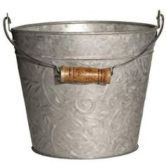 a metal bucket with a cork handle