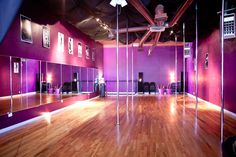 an empty dance studio with mirrors and lights