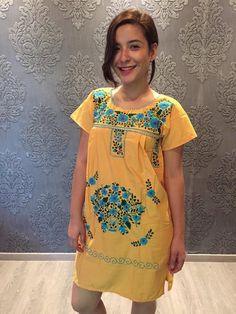 "Beautiful mini embroidered dress, ideal for spring and summer, mexican parties, etc. Bright and colourful Loose fit Made of cotton Fits size Small Measurements taken flat: - Shoulder to shoulder 16\" - Arm hole 8 1/4\" - Armpit to armpit 17 3/4\" - Width 22 1/2\" - Shoulder to bottom length 36 3/4\"" Summer Boho Sundress With Short Sleeves, Casual Cotton Boho Dress With Floral Embroidery, Summer Bohemian Embroidered Dress With Floral Print, Festival Floral Print Short Sleeve Dresses, Short Sleeve Embroidered Vacation Dress, Beach Embroidered Mini Cotton Dress, Bohemian Sundress With Floral Embroidery, Beach Mini Embroidered Cotton Dress, Bohemian Short Sleeve Cotton Boho Dress