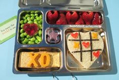 a bento box filled with different types of food and fruit in it's trays