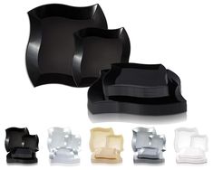 black and white plastic dishes with different colors on them, including one for each individual