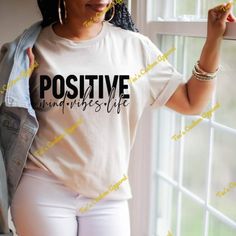 Positive Mind Vibes Life T-Shirt - FREE Shipping When You Spend $35! - Unisex T-shirt is 100% pre-shrunk cotton. - Available in Various Colors. SIZING: - In order to get an accurate size, we recommend finding a similar item you already have, lay it flat, and measure it in inches. - Make sure to match those measurements to the Size Chart. Care and Handling: - To ensure the longevity of your product we recommend washing this tee in cold water and drying on low heat or hang to dry. - Do not bleach. Positive Shirts, Energy Affirmations, Positive Tees, Positive Shirt, Positive Vibes Only, Positive Mind, Good Vibes Only, Positive Energy, Positive Vibes