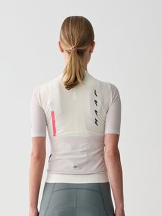 the back of a woman's cycling jersey