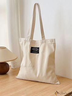 Bird in Bag - Beige Canvas Shopping Bag - Solid Color, Unisex, Foldable, Travel Ready Rectangular Beige School Bag, Cream Rectangular Canvas Bag For School, Beige Square Canvas Bag For School, Beige Softback Canvas Bag For School, Cream Rectangular Canvas School Bag, Rectangular Cream Canvas School Bag, Cream Tote Bag For School, Large Capacity Cream Canvas Bag, Beige Letter Print Travel Shoulder Bag