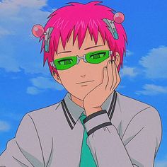 a man with pink hair and green glasses is looking at the camera while holding his hand to his face