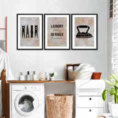 a laundry room with washer and dryer next to each other on the wall