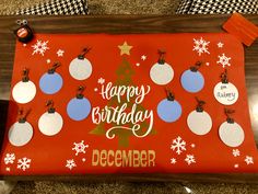 a decorated birthday board with ornaments on it