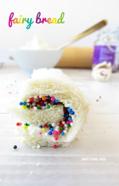 a close up of a pastry with sprinkles on it and the words fairy bread in the background