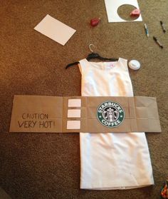 the contents of a starbucks bag are laid out on the floor