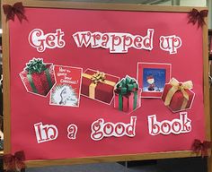 a sign that says get wrapped up in a good book with pictures of gifts on it