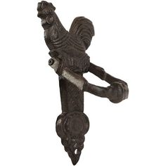 a metal hook with a bird on it's back and one arm holding onto the handle