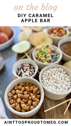 an assortment of candy and candies in bowls on a table with text overlay that says diy caramel apple bar