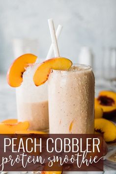 two peach cobbler protein smoothies on a plate