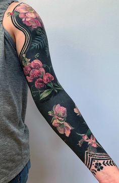 a person with a tattoo on their arm