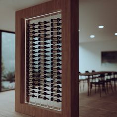 a wine rack in the middle of a room