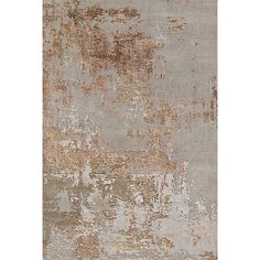 an area rug with different colors and textures