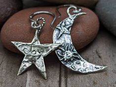 "These sterling silver, Artisan-crafted charms are on the large side with the star measuring 28mm x 22mm tall (including the loop), and the moon measuring 34 x 9mm at its widest area (height doesn't include loop). The star has the word, \"Joy\" inscribed on the back.  The moon has a raised star and sun on the front. The charms are hung from sterling silver fishhook ear wire with a total length of 47mm (approximately 1-3/4\") from the top of the ear wire to the bottom of the charm. If you have an Sun And Moon Earrings, Sun And Moon Dress, Chunky Silver Jewellery, Heart Clothes, Jewelry Lockets, Celestial Jewelry, Funky Jewelry, Moon Earrings, Star Earrings