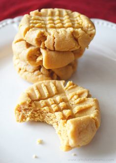 a white plate topped with cut up cookies