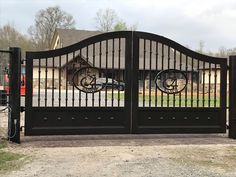 an iron gate with two bicycles on it