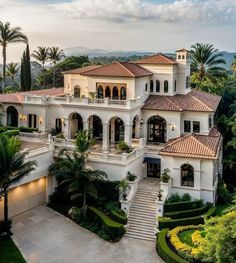 this is an aerial view of a large house with many windows and balconies