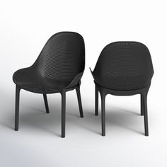 two black chairs sitting next to each other