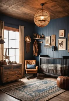 a baby's room with blue walls and wooden floors, a rocking chair, an old - fashioned crib, and pictures on the wall