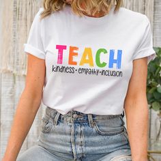 "Teach kindness, empathy and inclusion shirt  - perfect teacher shirt, special education teacher shirt, ABA shirt, SLP shirt, Pre K teacher shirt, Kindergarten teachers and more! Size of text and image will vary depending on the size of the shirt. If you would like something different or would like specific information, please feel free to message me! Sizing: Unisex. All measurements are taken while the shirts are lying flat. Width is measured across the chest (under arm to underarm). Length is measured from shoulder to the bottom of the shirt. T-shirts Approximately (Brand: Bella Canvas; Shirts fit True to size): **Size up 1-3 sizes for oversized look X-Small: 16.5\" W x 27\" L Small: 18\" W x 28\"L Medium: 20\" W x 29\" Large: 22\"W x 30\" L XL: 24\" W x 31\" L 2XL: 26 w x 32\" L 3XL: 28 Inclusion Teacher, Xmas Vibes, Pre K Teacher, Slp Shirts, Education Shirts, Kindness Shirt, Truck Shirts, Sped Teacher, Teacher Assistant