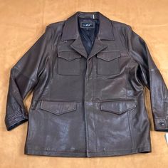 In New W/Tag Conditions Shell : 100% Genuine Leather (Lambskin) Lining : 100% Polyester Made In China Size Xxl 21.25” Shoulder 27.5” Pit To Pit 27” Sleeve 32” Back Length What You See Is What You Will Get Thank You. 670-957/4.5/Bx Winter Business Leather Jacket With Welt Pockets, Classic Leather Jacket With Multiple Pockets, Fitted Leather Jacket With Welt Pockets For Winter, Classic Winter Blazer With Multiple Pockets, Classic Business Outerwear With Multiple Pockets, Classic Leather Jacket With Welt Pockets For Winter, Leather Coat Jacket, Wilsons Leather Jacket, Men's Coats And Jackets