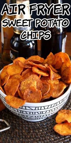 air fryer sweet potato chips in a white bowl on a wicker place mat