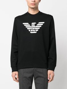 Find EMPORIO ARMANI Logo-print Cotton Sweatshirt on Editorialist. black cotton-modal blend logo print at the chest crew neck long sleeves straight hem Conscious: This item contains at least 50% low-impact materials, which are certified or widely recognised as having a lower environmental impact. Long Sleeve Cotton Sweatshirt With Logo, Long Sleeve T-shirt With Logo For Streetwear, Black Long Sleeve Tops With Logo, Black Cotton Sweatshirt With Logo, Black Crew Neck Sweatshirt With Logo, Black Logo Sweatshirt With Crew Neck, Black Crew Neck Top With Logo Detail, Black Logo Crew Neck Sweatshirt, Logo Crew Neck Top For Fall