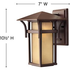 an outdoor wall light with measurements