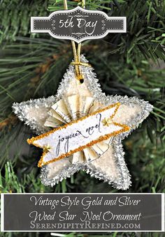 an ornament hanging from a christmas tree with the words vintage style gold and silver ribbon