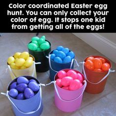 four buckets filled with colored eggs sitting on the floor next to an egg hunt