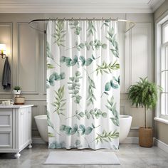 a white bath tub sitting next to a shower curtain