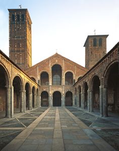 an old building with stone floors and arches