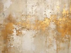 an abstract painting with gold paint on it's walls and the bottom half painted yellow