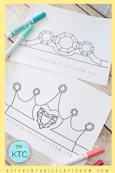 two printable coloring pages with crayons and markers on the table next to them