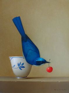 a blue bird sitting on top of a cup with a cherry in it's beak