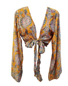 Get comfy in style with our Orange Blossom Boho Bell Sleeve Tie Top! Featuring adjustable tie front and bell sleeves, this top is perfect for the free-spirited fashionista. Let the paisley print add some hippie vibes to your wardrobe! (Free-spirited fashion included!) Bell Sleeve Shirts, Bohemian V-neck Top With Boho Print, Bohemian Boho Print V-neck Top, Bohemian V-neck Tops With Boho Print, Printed V-neck Top For Festival, Bohemian Patterned V-neck Top, Festival V-neck Printed Top, Summer Hippie V-neck Peasant Top, Beach V-neck Peasant Top With Boho Print