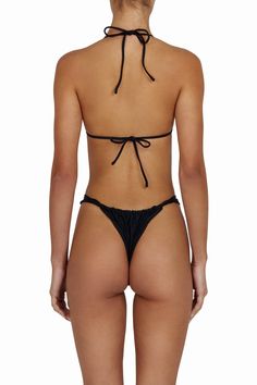 AMORE bottoms - jet black – BĀMBA SWIM International Trendy Black Swimming Bottoms, Seamless Fitted Tie-side Intimate Bottom, Black Stretch Flirty Swimwear, Black Flirty Stretch Swimwear, Flirty Stretch Black Swimwear, Flirty Black Stretch Swimwear, Fitted Bottoms With Ruched Sides For Vacation, Black Swimwear With Adjustable Straps And Tie-side Bottom, Black Stretch Tie-side Bottoms