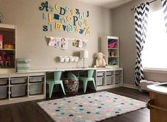 a child's playroom with toys and storage