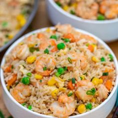 two white bowls filled with shrimp and rice