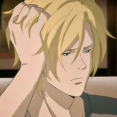 an anime character with blonde hair holding his hands up to his head and looking at the camera