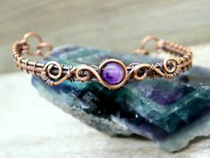 Purple Cuff Bangle Bracelet As Gift, Adjustable Wire Wrapped Cuff Bracelet Gift, Unique Purple Cuff Bracelet As Gift, Unique Purple Cuff Bracelet For Gift, Handmade Adjustable Purple Cuff Bracelet, Adjustable Copper Cuff Bracelet, Adjustable Round Spiritual Cuff Bracelet, Adjustable Round Copper Cuff Bracelet, Adjustable Copper Bracelet For Gift